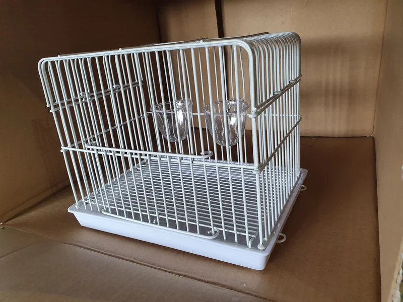 Jaula de transporte blanca 23x15.5x17