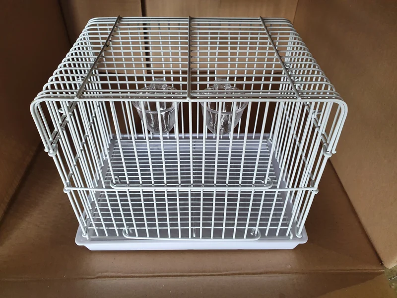 Jaula de transporte blanca 23x15.5x17