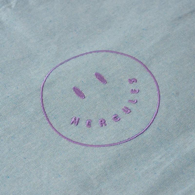 Funda bordada Smiley Celeste